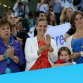 Mother of gold medallist Michael Phelps of the United States, Debbie Phelps(L) and his sisters Hilary (C) and Whitney (R) watch the medal ceremony for the Men’s 4x100m medley Relay Final on Day 8 of the London 2012 Olympic Games at the Aquatics Centre on August 4, 2012