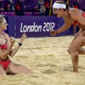 Kerri Walsh and Misty May-Treanor and celebrate at the end of the women Beach Volleyball final match against April Ross and Jennifer Kessy at the London 2012 Olympic Games on August 08, 2012