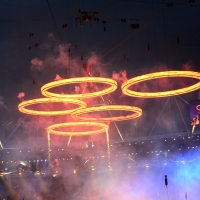 Freshly ‘forged’ Olympic Rings fly above the chimneys during The Age of Industry scene in the opening ceremony of the London 2012 Olympic Games at the Olympic Stadium in London on July 27, 2012