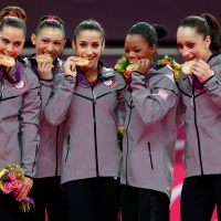 McKayla Maroney, Kyla Ross, Aly Raisman, Gabrielle Douglas and Jordyn Wieber of Team USA celebrate after winning the gold medal in the Artistic Gymnastics Women’s Team final at the London 2012 Olympic Games on July 31, 2012
