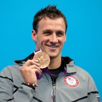 Ryan Lochte is all smiles at the medal ceremony the Men’s 200m Individual Medley final on Day 6 of the London 2012 Olympic Games at the Aquatics Centre in London on August 2, 2012 