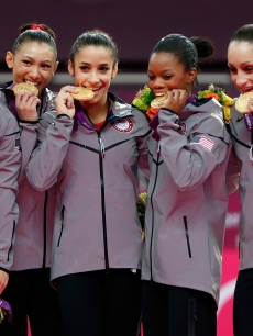 McKayla Maroney, Kyla Ross, Aly Raisman, Gabrielle Douglas and Jordyn Wieber of Team USA celebrate after winning the gold medal in the Artistic Gymnastics Women’s Team final at the London 2012 Olympic Games on July 31, 2012