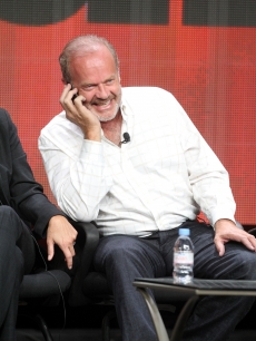 Kelsey Grammer speaks on a cell phone at the ‘Boss’ discussion panel during the Starz portion of the 2012 Summer Television Critics Association tour at the Beverly Hilton Hotel on August 2, 2012
