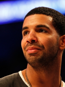 Drake looks on during the 2012 NBA All-Star Game at the Amway Center, Orlando, on February 26, 2012