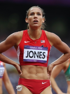 Lolo Jones of the United States looks on at the scoreboard in anticipation after competing in the Women’s 100m Hurdles Semifinals on Day 11 of the London 2012 Olympic Games at Olympic Stadium on August 7, 2012
