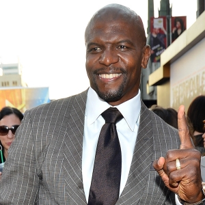 Terry Crews Flexes His Pecs At The Expendables 2 Premiere
