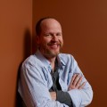 Joss Whedon of ‘Much Ado About Nothing’ poses at the Guess Portrait Studio during 2012 Toronto International Film Festival on September 9, 2012 in Toronto
