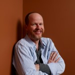 Joss Whedon of ‘Much Ado About Nothing’ poses at the Guess Portrait Studio during 2012 Toronto International Film Festival on September 9, 2012 in Toronto