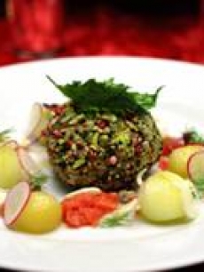 Chef Joachim Splichal’s Smoked salmon avocado sphere, crisp vegetables with fresh hearts of palm, cucumber apple, red radish with an heirloom tomato vinaigrette