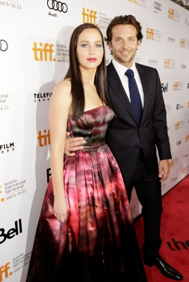 Jennifer Lawrence and Bradley Cooper arrive at the ‘Silver Linings Playbook’ Premiere during the 2012 Toronto International Film Festival at the Roy Thomson Hall in Toronto on September 8, 2012 