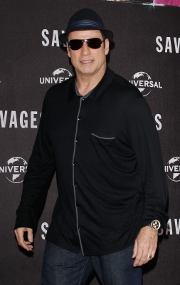 John Travolta attends the ‘Savages’ Photocall at Hotel Adlon on September 17, 2012 in Berlin, Germany