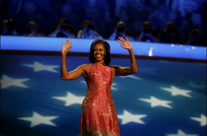 First Lady Michelle Obama waves before speaking at the Democratic National Convention (DNC) in Charlotte, North Carolina, U.S., Sept. 4, 2012