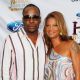 Bobby Brown and wife Alicia Etheredge walk the blue carpet at the 10th Annual Ford Hoodie Awards at MGM Garden Arena in Las Vegas on August 4, 2012 