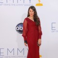 Mayim Bialik looks radiant in red at the 64th Annual Primetime Emmy Awards at Nokia Theatre L.A. Live in Los Angeles on September 23, 2012 