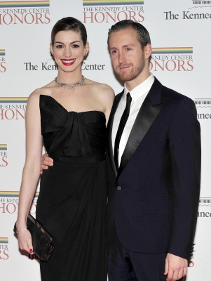 Anne Hathaway and Adam Shulman arrive for the formal Artist’s Dinner honoring the recipients of the 2011 Kennedy Center Honors hosted by United States Secretary of State Hillary Rodham Clinton at the U.S. Department of State, Washington, D.C., December 3, 2011