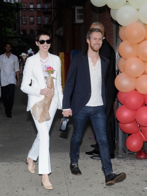 Anne Hathaway and fiance Adam Shulman attend the Stella McCartney Spring 2012 Presentation at Stella McCartney Store, New York City, on June 11, 2012