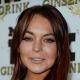 Lindsay Lohan arrives at Mr. Pink Ginseng Drink Launch Party on October 11, 2012 in Beverly Hills, Calif.