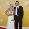 Carrie Underwood and husband Mike Fisher attend the 46th annual CMA Awards at the Bridgestone Arena in Nashville on November 1, 2012 