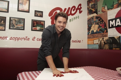 ‘Dallas’ hunk Josh Henderson celebrates his birthday at Buca di Beppo in Mesquite, Texas, where he was immortalized in marinara sauce following the meal on October 21, 2012