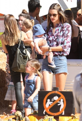 Victoria’s Secret model Alessandra Ambrosio takes children Anja and Noah out for some fun at Mr. Bones Pumpkin Patch in Los Angeles on October 14, 2012