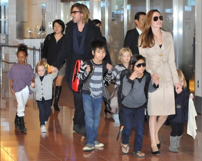 Brad Pitt, Angelina Jolie and their six children Maddox, Pax, Zahara, Shiloh, Knox, and Vivienne arrive at Haneda International Airport in Tokyo on November 8, 2011