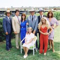 A promotional still from the American television series ‘Dallas’ shows the cast assembled on the property of the Southfork ranch, on the outskirts of Dallas, Texas, 1979. From left, American actors Steve Kanaly (as Ray Krebbs), Patrick Duffy (as Bobby Ewing), Victoria Principal (as Pamels Barnes Ewing), (sitting), Barbara Bel Geddes (as Eleanor Southworth ‘Miss Ellie’ Ewing), Jim Davis (1909 - 1981) (as John Ross ‘Jock’ Ewing), Larry Hagman (as John Ross ‘J.R.’ Ewing, Jr.), Charlene Tilton (as Lucy Ewing) (in red), and Linda Gray (as Sue Ellen Ewing)