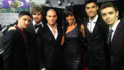 Access Hollywood’s Shaun Robinson with The Wanted at the AMAs, Los Angeles, Nov. 18, 2012