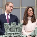 Prince William, Duke of Cambridge and Catherine, Duchess of Cambridge stand on the balcony of The Guildhall during their first official visit to Cambridge on November 28, 2012 in Cambridge, England