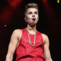  Justin Bieber performs onstage during Q102’s Jingle Ball 2012 presented by XFINITY, at Wells Fargo Center on December 5, 2012 in Philadelphia