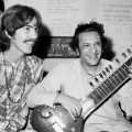 Guitarist George Harrison poses for a portrait with Indian sitar virtuoso Ravi Shankar in circa 1975