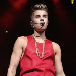  Justin Bieber performs onstage during Q102’s Jingle Ball 2012 presented by XFINITY, at Wells Fargo Center on December 5, 2012 in Philadelphia