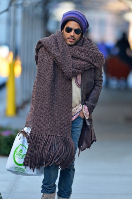 Lenny Kravitz fights the winter chill with a giant scarf and knit hat, as he goes out and about in New York City on  November 25, 2012 