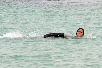 Jennifer Lawrence jumps in the water while filming ‘The Hunger Games: Catching Fire’ in Hawaii on November 26, 2012
