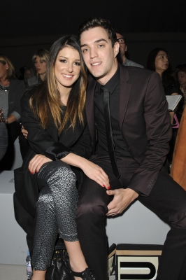 Shenae Grimes and Josh Beech attend the front row for the Unique show on day 3 of London Fashion Week Spring/Summer 2013 at TopShop Venue on September 16, 2012 in London