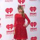 Taylor Swift poses in the press room at the iHeartRadio Music Festival at the MGM Grand Garden Arena September 21, 2012 in Las Vegas