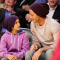 David Beckham and his son Romeo attend a basketball game between the Oklahoma City Thunder and the Los Angeles Lakers at Staples Center on March 29, 2012 in Los Angeles