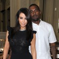 Kim Kardashian and Kanye West attend the Valentino Haute-Couture show as part of Paris Fashion Week Fall / Winter 2012/13 at Hotel Salomon de Rothschild on July 4, 2012 in Paris