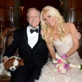 Hugh Hefner and Crystal Harris pose for photos following their wedding at the Playboy Mansion on December 31, 2012
