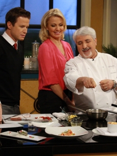Chef Celestino Drago shows Billy Bush and Michelle Beadle the feast of the seven fishes on Access Hollywood Live on December 21, 2012