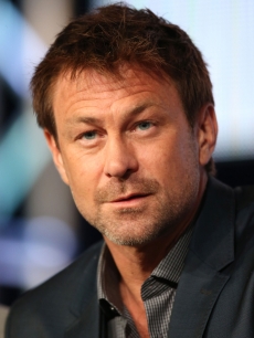 Grant Bowler speaks onstage at the ‘Defiance’ panel discussion during the Syfy portion of the 2013 Winter TCA Tour- Day 4 at the Langham Hotel on January 7, 2013 in Pasadena, Calif
