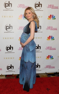 Holly Madison shows off her baby bump at the 2012 Miss Universe Pageant at Planet Hollywood Resort & Casino in Las Vegas on December 19, 2012