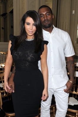 Kim Kardashian and Kanye West attend the Valentino Haute-Couture show as part of Paris Fashion Week Fall / Winter 2012/13 at Hotel Salomon de Rothschild on July 4, 2012 in Paris