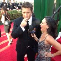 Nathan Fillion and AccessHollywood.com’s Laura Saltman at the 70th Annual Golden Globe Awards held at The Beverly Hilton Hotel on January 13, 2013