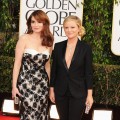 Hosts Tina Fey and Amy Poehler arrive at the 70th Annual Golden Globe Awards held at The Beverly Hilton Hotel on January 13, 2013