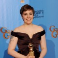 ‘Girls’ star Lena Dunham poses with Best Actress in a TV Comedy Award in the press room during the 70th Annual Golden Globe Awards
