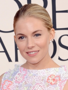 Sienna Miller arrives at the 70th Annual Golden Globe Awards held at The Beverly Hilton Hotel on January 13, 2013 