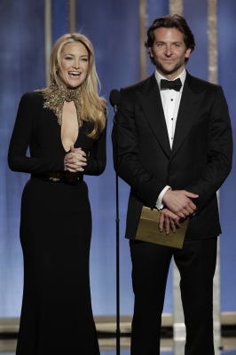 Kate Hudson and Bradley Cooper present on stage during the 70th Annual Golden Globe Awards at the Beverly Hilton Hotel International Ballroom on January 13, 2013 