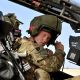 Prince Harry sits in the front seat of the cockpit of an Apache Helicopter Pilot/Gunner at the British controlled flight-line in Camp Bastion on October 31, 2012