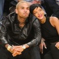 Chris Brown & Rihanna get close during the Los Angeles Lakers/New York Knicks game on December 25, 2012 in Los Angeles
