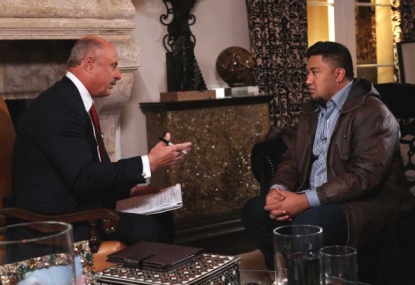Dr. Phil McGraw and Ronaiah Tuiasosopo